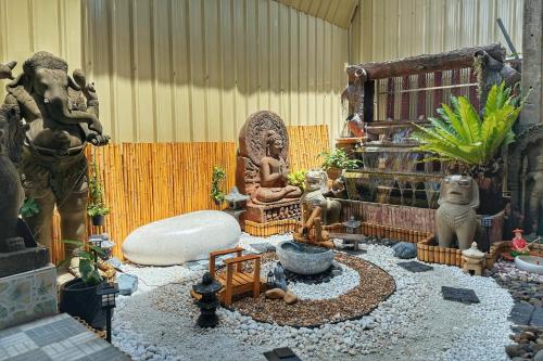 Baan Inta Hostel - บ้านอินตาโฮสเทล - 정원