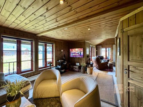 Modern cabin sauna, BBQ & beautiful view Filefjell in Tyinkrysset
