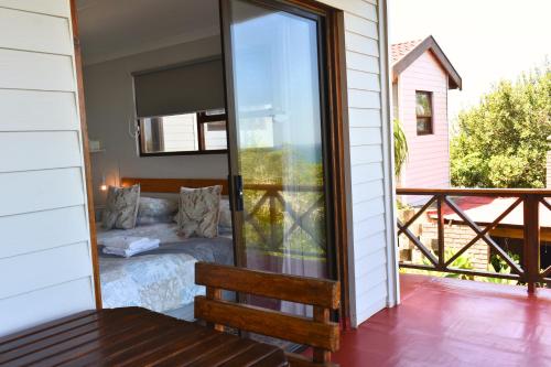 Balkons/terase, At Whale-Phin Guest House in Reebok