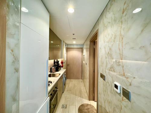 Homes2Retreat - Chic Riviera Studio in Meydan, Dubai (photo 9)