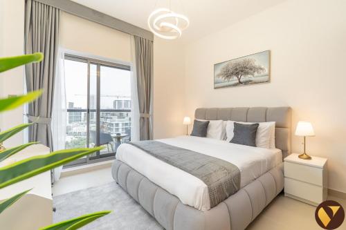 Vogue Jumeirah Village Circle - Stylish One Bedroom Apartment in Jeewar Tower with Balcony, Pool and Gym, Dubái (foto 4)
