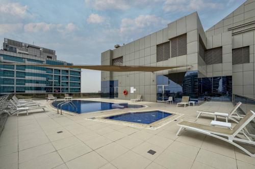 Swimming pool, Modern Studio in the Heart of Sports City in Dubai Sports City