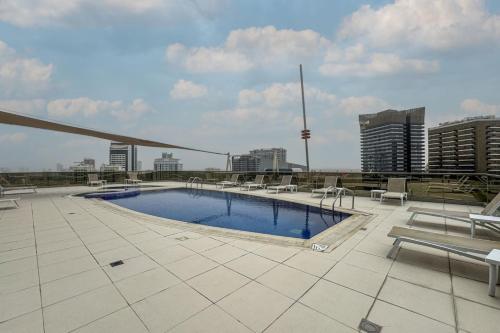 Swimming pool, Modern Studio in the Heart of Sports City in Dubai Sports City