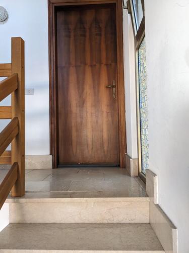 Camera con bagno in villa in ปิเอเว เอมานูเอเล