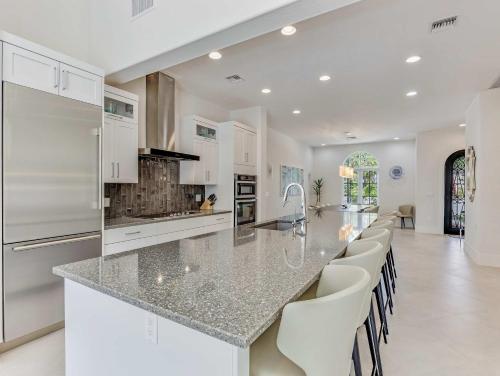 Casa Captiva - Deluxe 5 Bedroom Villa Steps to Beach in แคปติวาไอส์แลนด์ (FL)