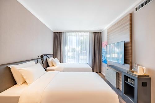 Hanting Hotel Beijing Jiujingzhuang Heyi Subway Station in محطة سكة حديد الجنوب / يونغدينغمن / نانيوان