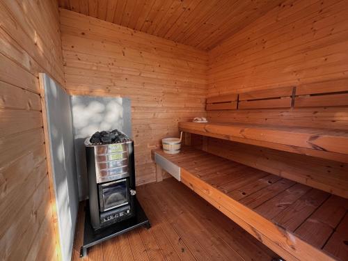 Szauna, Ostrov klidu - posed - sauna in Skvorec