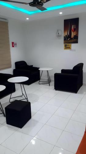 Krogs/atpūtas telpa, Sleepeaze Hotel in Afienya