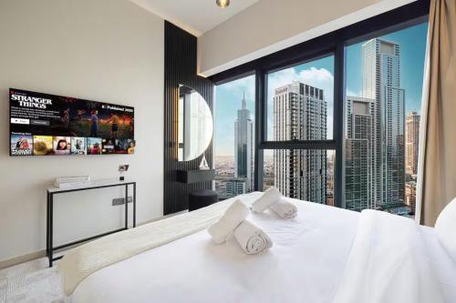 Restay Homes at Act Towers - Pool access with Burj View, Дубай (фото 3)