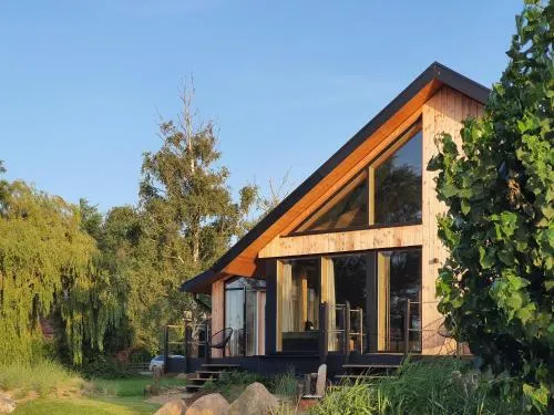 WerderChalet -- MEER IN SICHT -- Meerblick I Strand 150m I Sauna I eKamin I bis 5 Pers I by "Meyers am Meer" in Boiensdorf, Deutschland