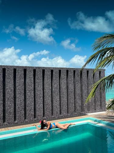 Zwembad, Nest by Hawks Hotel Kamadhoo Baa Atoll in Baa Atoll
