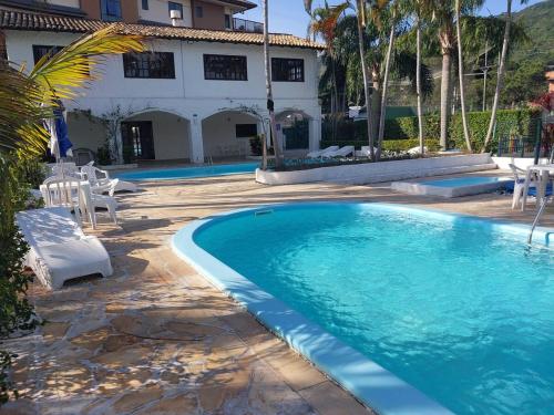 BEIRA DA PRAIA CONDOMINIO PRAIAS BRANCAS, PRAIA CACHOEIRA BOM JESU, FLORIANOPOLIS, casa 70 in 卡舒埃拉杜邦熱蘇斯