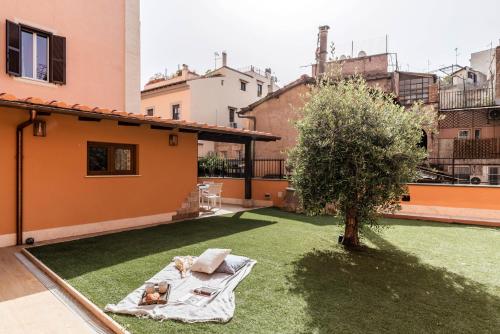 The Best Rent - Peaceful oasis with garden near the Colosseum, Roma (foto 2)