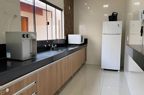 Konyha, Espaçosa casa próxima ao Centro (Espacosa casa proxima ao Centro) near Romeu Zema repülőtér