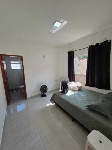 Casa com piscina e espaço churrasco Itanhaem (Casa com piscina e espaco churrasco Itanhaem) in 博皮兰加