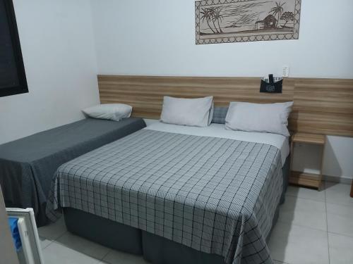 Pousada Parque Suites - Estacionamento e Piscina na Enseada - image 2