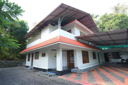  négyzetméteres, 3 hálószobás  3 fürdőszobával Kodanad területén (Haritha home stay) in Kodanad