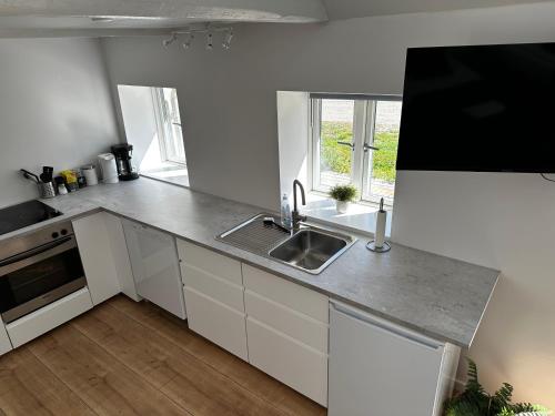 Ebogaard in 希勒勒