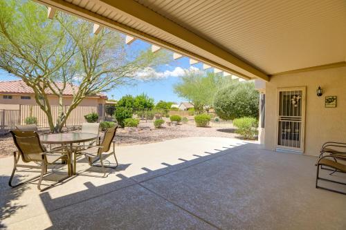 Near Golf Inviting Surprise Home with Covered Patio in Sun City