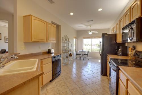 Near Golf Inviting Surprise Home with Covered Patio in Sun City