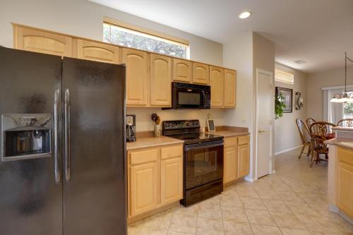 Near Golf Inviting Surprise Home with Covered Patio in Sun City