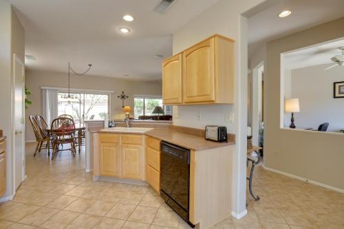 Near Golf Inviting Surprise Home with Covered Patio in Sun City