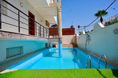 Appartement de Luxe - Piscine et Accès à la Plage, Harhoura
