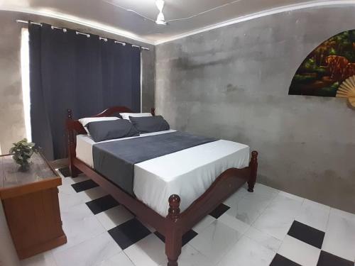 เตียงนอน, Entire 2 -Bedroom Apartment with Extra Sleeping Area and Living Room, Kitchen- PORT MORESBY in พอร์ตมอร์สบี