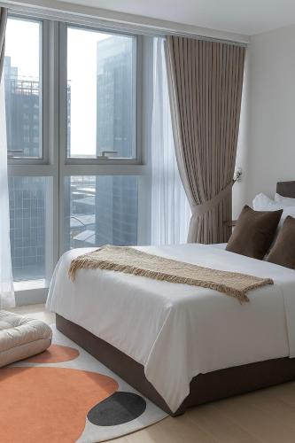 Cozy 1-Bedroom in Uptown Parksuites BGC, Manila