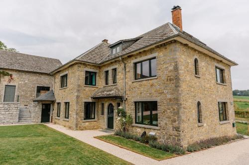 La Ferme d'Auwez - Les Hirondelles - Gîte 15 pers avec piscines et sauna gîte à louer Trieu de Dinant