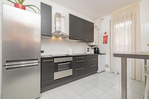 Kitchen, Fiori del Lario- Rho fiera Mi -6 POSTI LETTO in Cesate