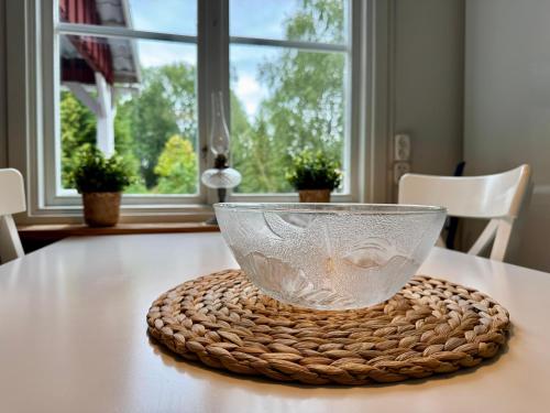 House near forest and water in Laggasen