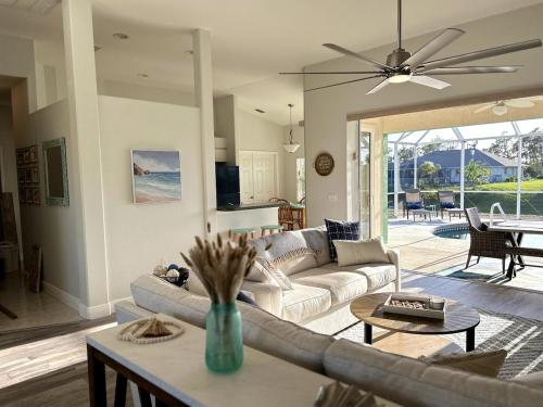 Family Friendly 3BR with Sunset Views Heated Pool Canal Front near Beach