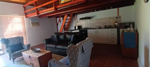 廚房, Jakkalsroep Cottage in 陶斯河