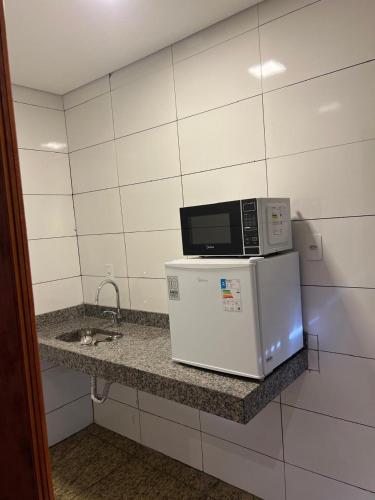 Konyha, suítes Pousada Catuira 1 (suites Pousada Catuira 1) near Romeu Zema repülőtér