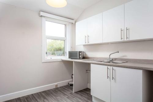 кухня, The Bay Suite - Donnini Apartments in Трун