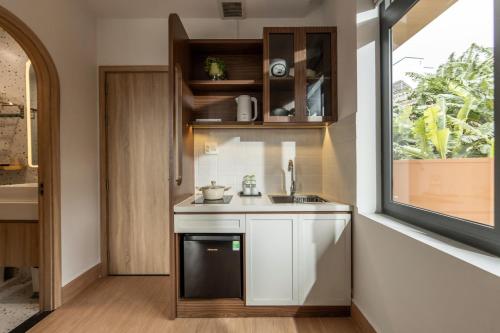 Kitchen, Almira Home Da Lat in Cam Ly Falls