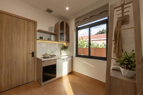 Kitchen, Almira Home Da Lat in Cam Ly Falls
