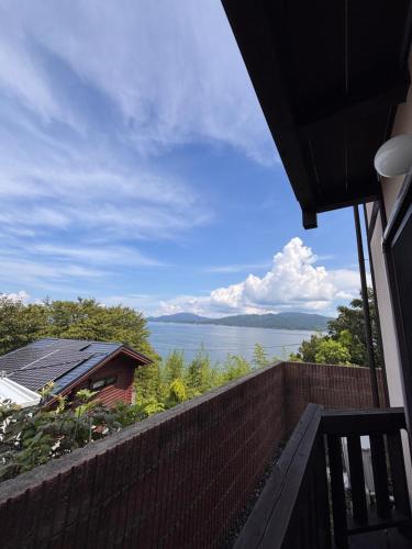 Amakusa Log House with Sea and Sunset View
