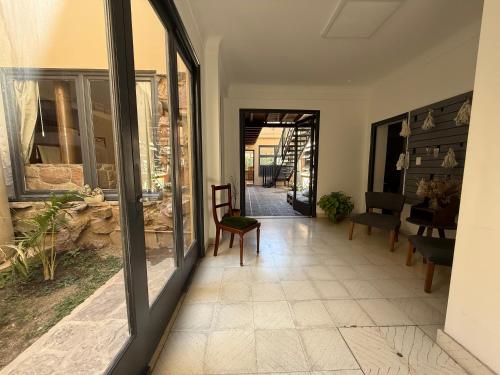 gedeelde lounge/tv-ruimte, Clivias Hostel in Salta