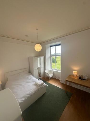 Tweepersoonskamer, gedeelde badkamer
