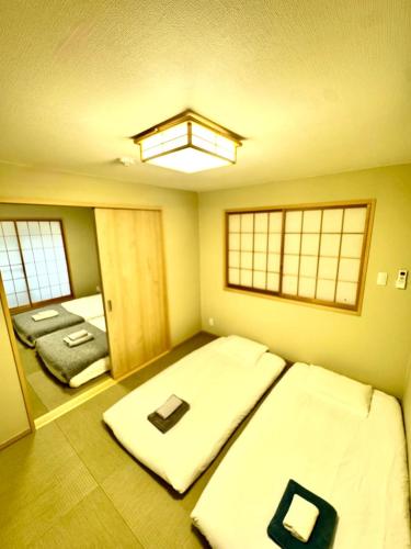 慧寓心斎橋南一号HOUSE A 天下茶屋駅步行5分钟関西空港南海線直达88m'日式別莊单元一難波黒門市場通天閣直达