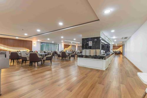 艺龙万国酒店 - 레스토랑