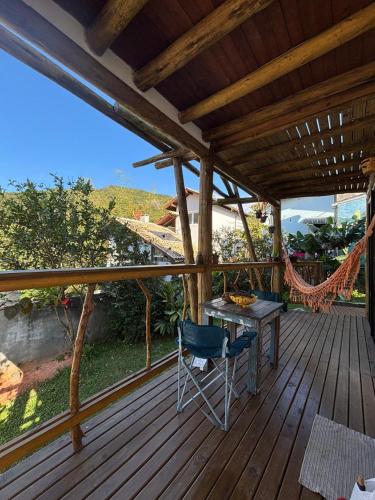 Erkély/terasz, Quarto com banho privado e lavanderia in Joaquina Beach