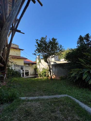 Quarto com banho privado e lavanderia in Joaquina Beach