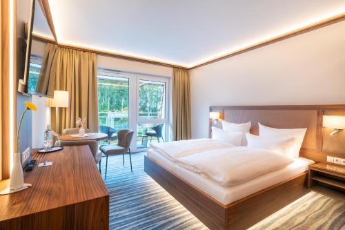 Strandhotel Seerose Room Type - Deluxe Double Room with Balcony and Side Sea View