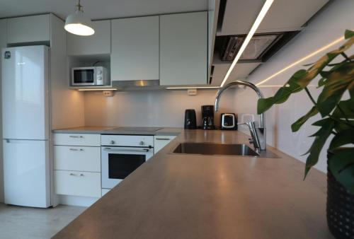 Kitchen, Convenient Apartment for 4 with Sauna in Henttaa