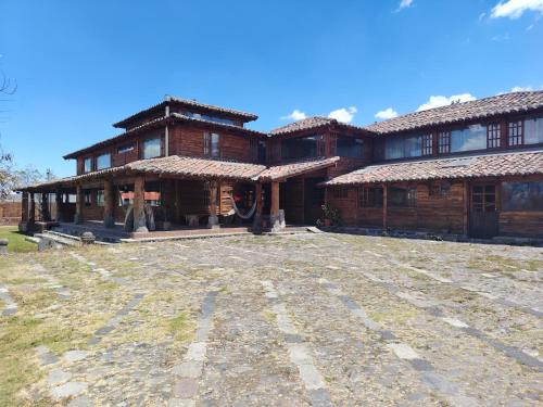 Centro de Aclimatizacion La Casa de Simon Lodge in Tanicuchi