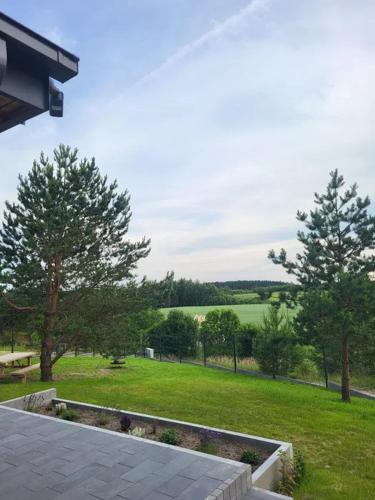 Dom nad jeziorem w Borzechowie - Po Horyzont in Bialachowo