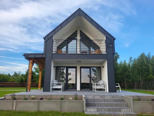 Dom nad jeziorem w Borzechowie - Po Horyzont - Borzechowo